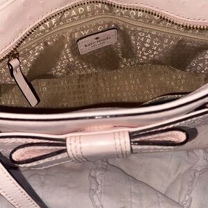 Beautiful Kate space bag with bow, super girly and cute.